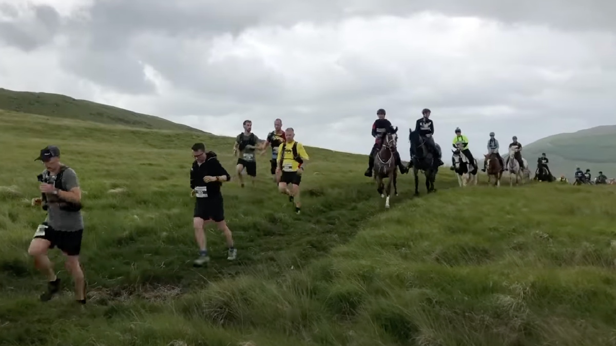 Runners and horses in Man v Horse race